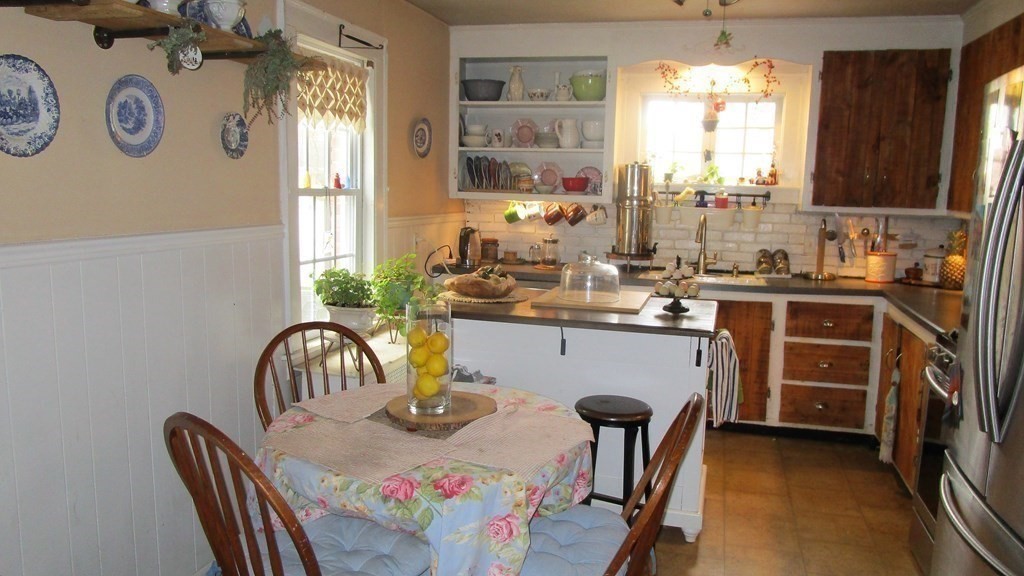 45 Upton Street Springfield, MA 01104 - Photo 5 of 19 a dining room with furniture and window