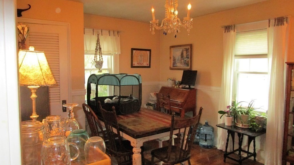 45 Upton Street Springfield, MA 01104 - Photo 7 of 19 a view of a workspace with furniture and a window