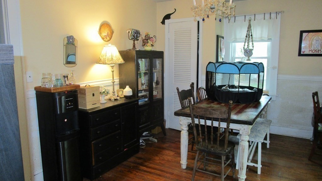 45 Upton Street Springfield, MA 01104 - Photo 8 of 19 a kitchen with a table and chairs in it