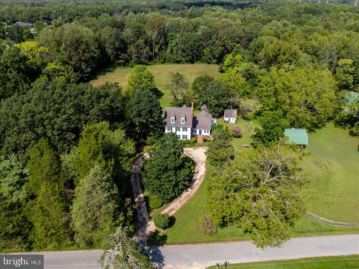 16410 St Marys Church Road Aquasco, MD 20608 - Photo 11 of 64 an aerial view of residential house with outdoor space