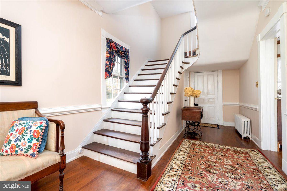 16410 St Marys Church Road Aquasco, MD 20608 - Photo 21 of 64 a view of entryway with furniture and stairs