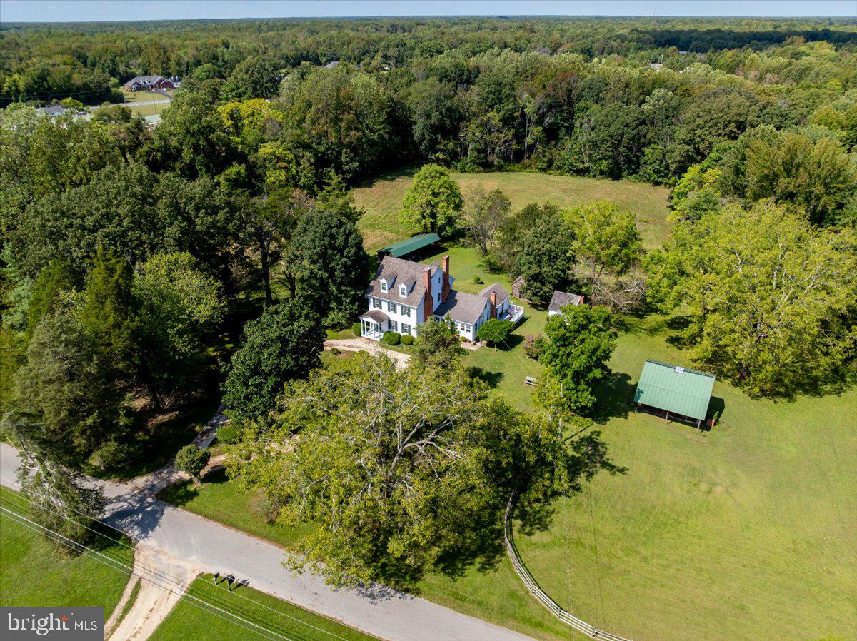 16410 St Marys Church Road Aquasco, MD 20608 - Photo 10 of 64 an aerial view of a residential houses with yard