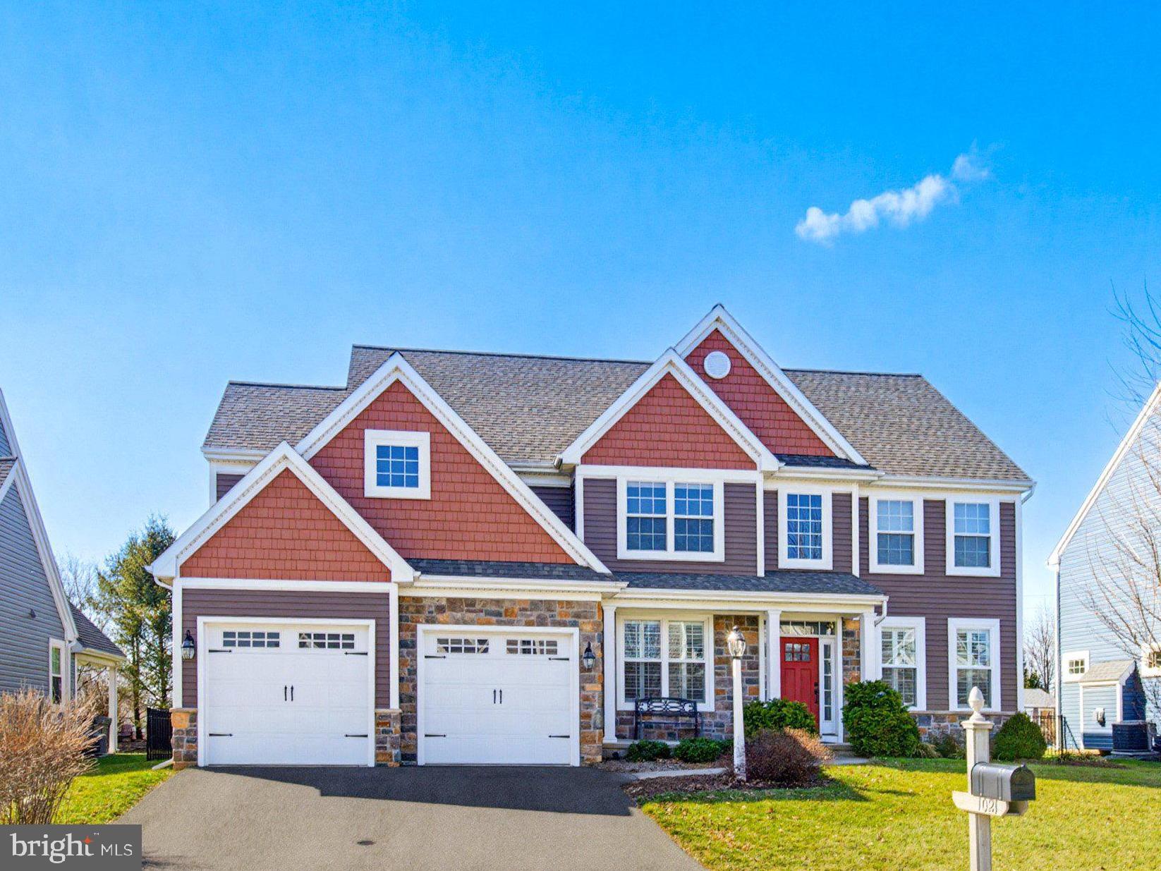 1021 Suffolk Drive Lititz, PA 17543 - Photo 1 of 44 a front view of a building with garden