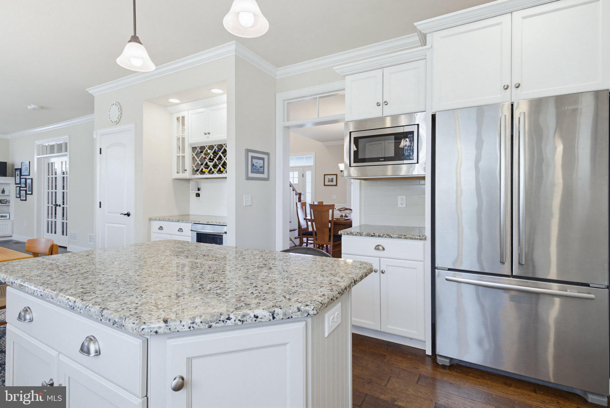 1021 Suffolk Drive Lititz, PA 17543 - Photo 14 of 44 a kitchen with granite countertop a refrigerator oven a sink and dishwasher