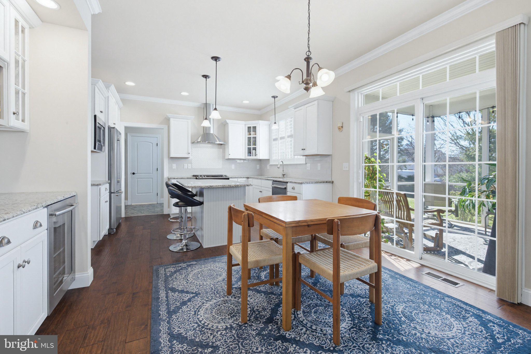 1021 Suffolk Drive Lititz, PA 17543 - Photo 15 of 44 a large kitchen with a table and chairs
