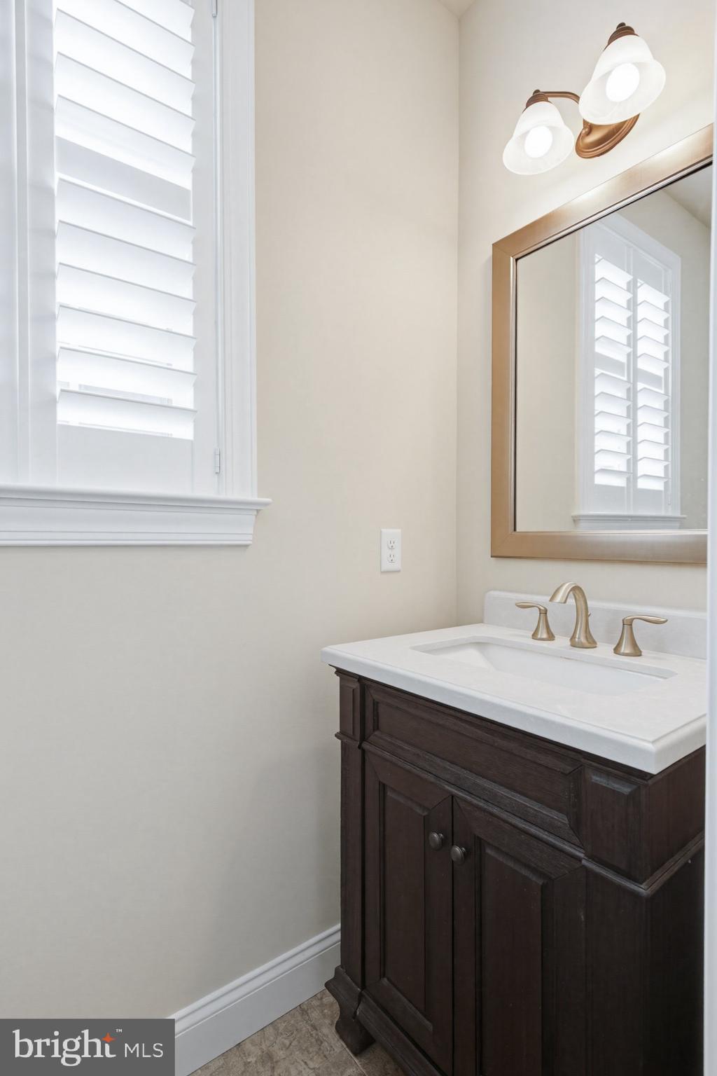 1021 Suffolk Drive Lititz, PA 17543 - Photo 19 of 44 a bathroom with a sink and a mirror