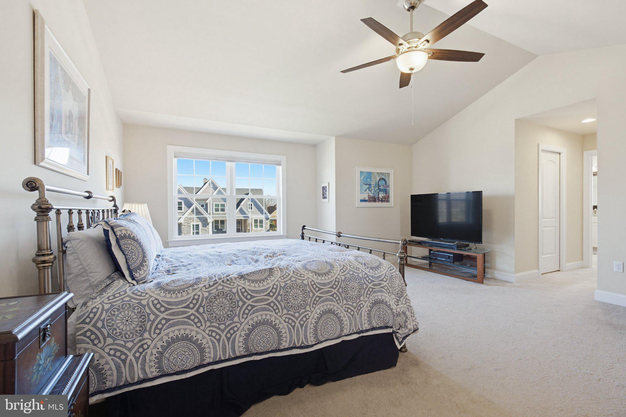 1021 Suffolk Drive Lititz, PA 17543 - Photo 20 of 44 a bedroom with a bed and a flat screen tv