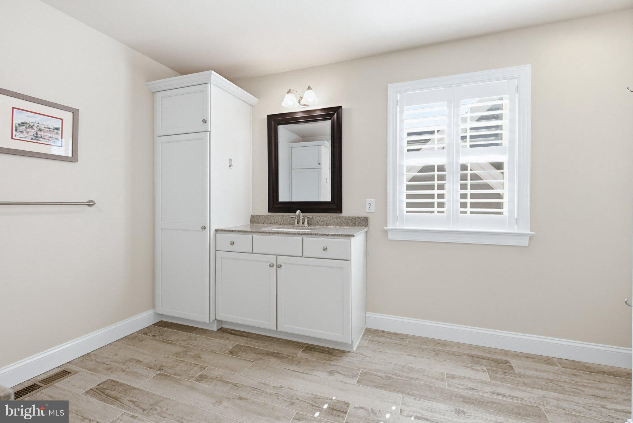 1021 Suffolk Drive Lititz, PA 17543 - Photo 22 of 44 a view of a bathroom with cabinet