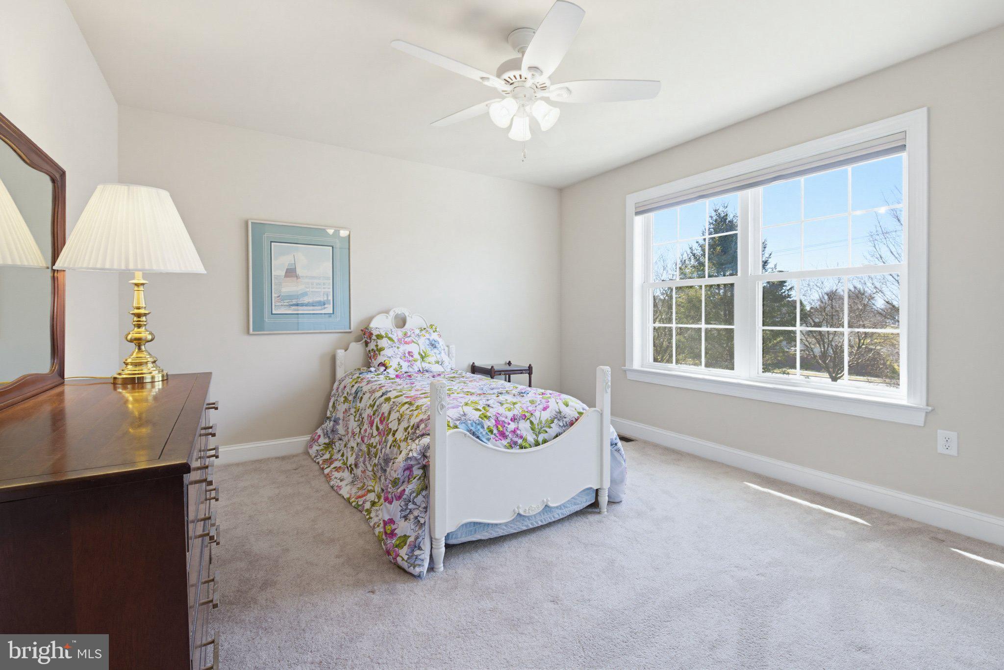 1021 Suffolk Drive Lititz, PA 17543 - Photo 25 of 44 a bedroom with a bed and a table