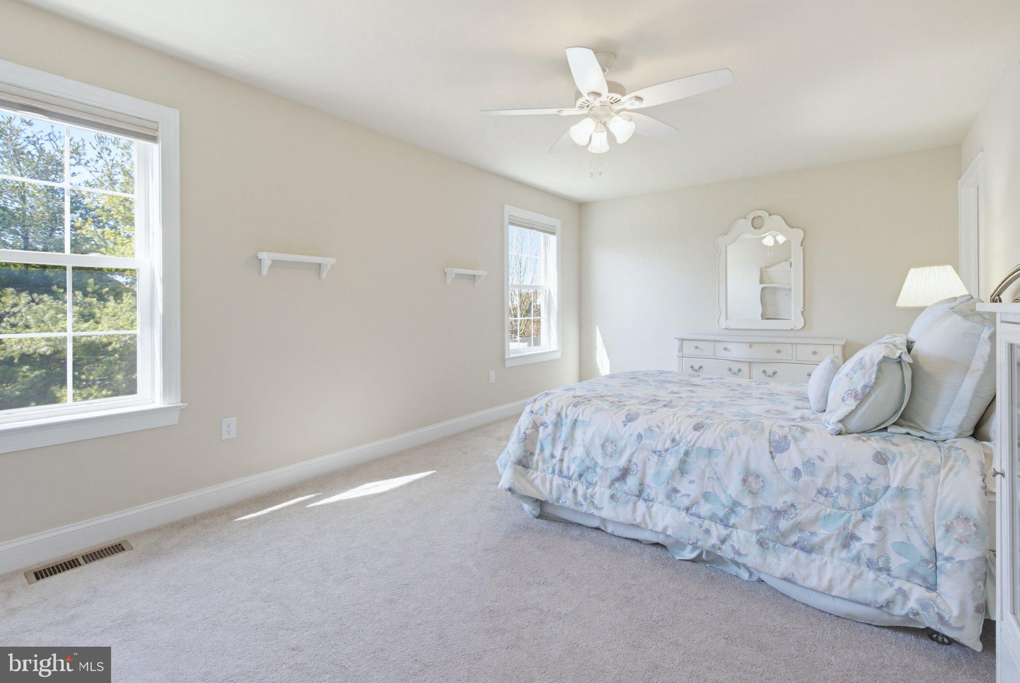 1021 Suffolk Drive Lititz, PA 17543 - Photo 27 of 44 a spacious bedroom with a bed and a large window