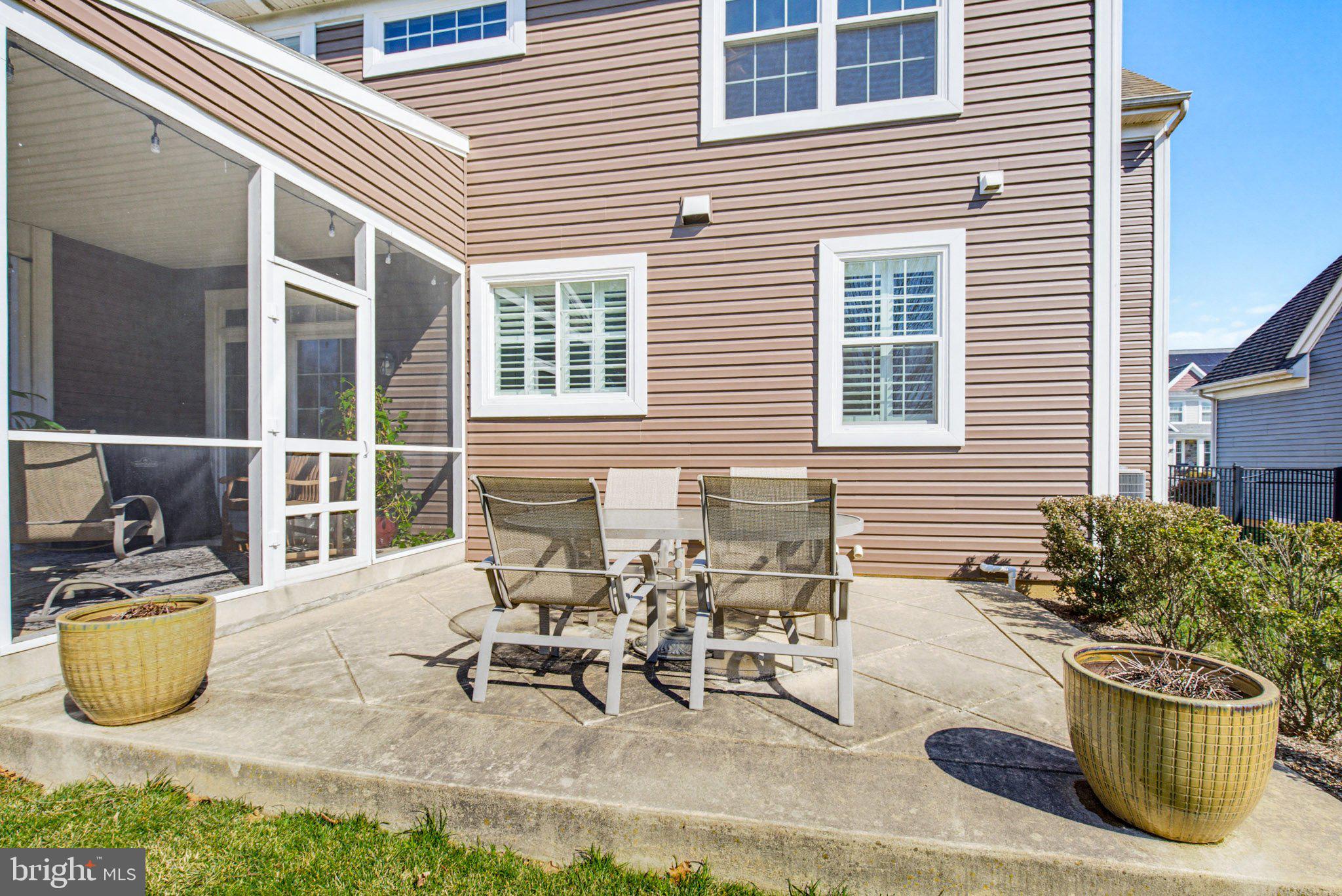 1021 Suffolk Drive Lititz, PA 17543 - Photo 35 of 44 a view of a patio with table and chairs