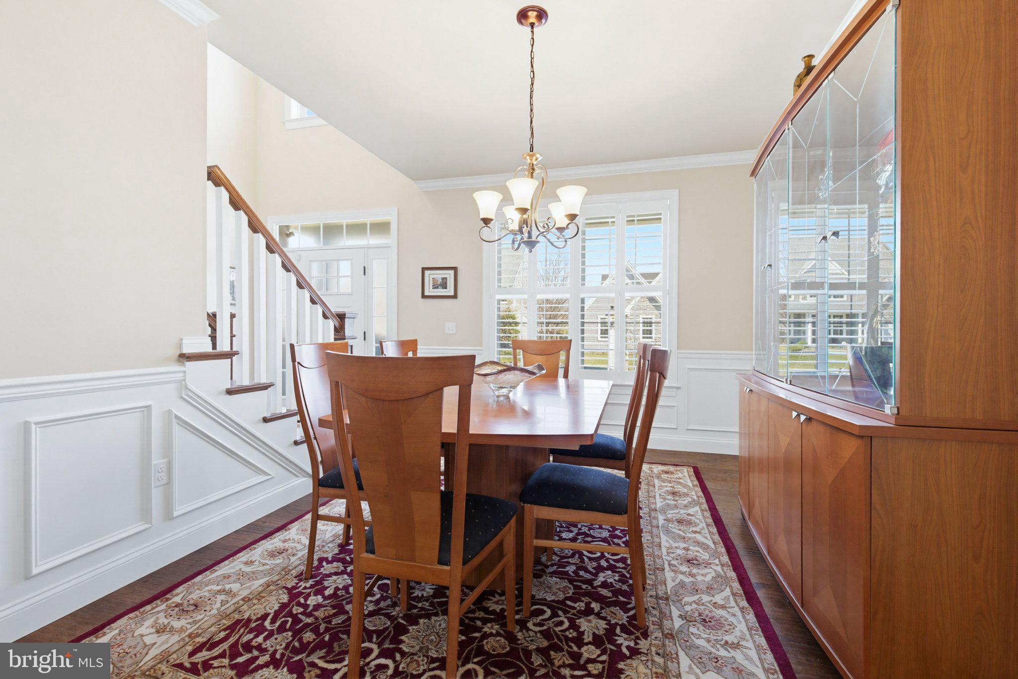 1021 Suffolk Drive Lititz, PA 17543 - Photo 6 of 44 a view of a dining room with furniture wooden floor and chandelier
