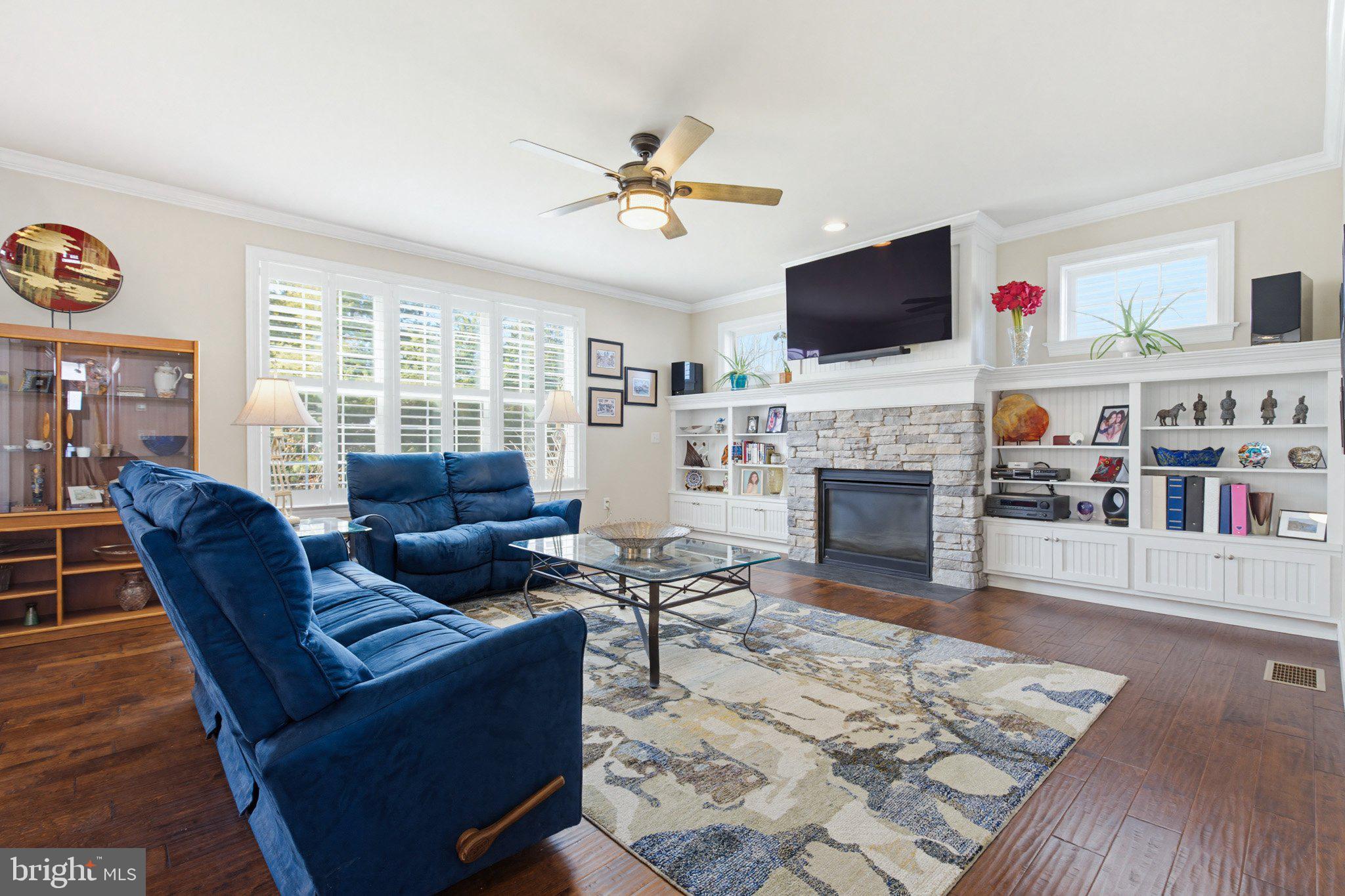 1021 Suffolk Drive Lititz, PA 17543 - Photo 9 of 44 a living room with fireplace furniture and a flat screen tv