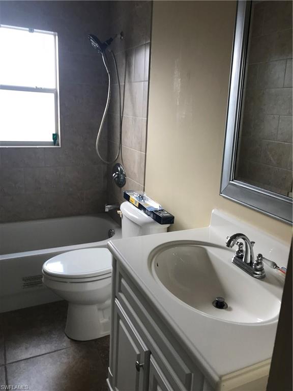 9108 Henry Road Fort Myers, FL 33967 - Photo 13 of 18 a bathroom with a sink and a toilet