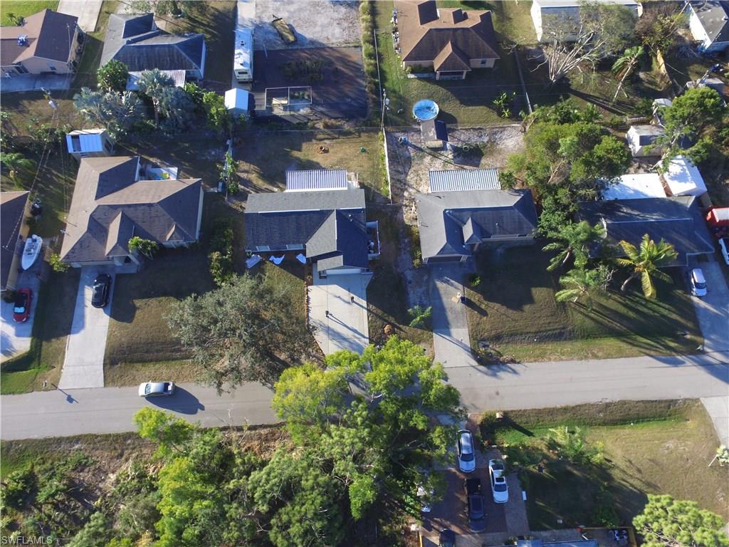 9108 Henry Road Fort Myers, FL 33967 - Photo 17 of 18 an aerial view of a house with a garden
