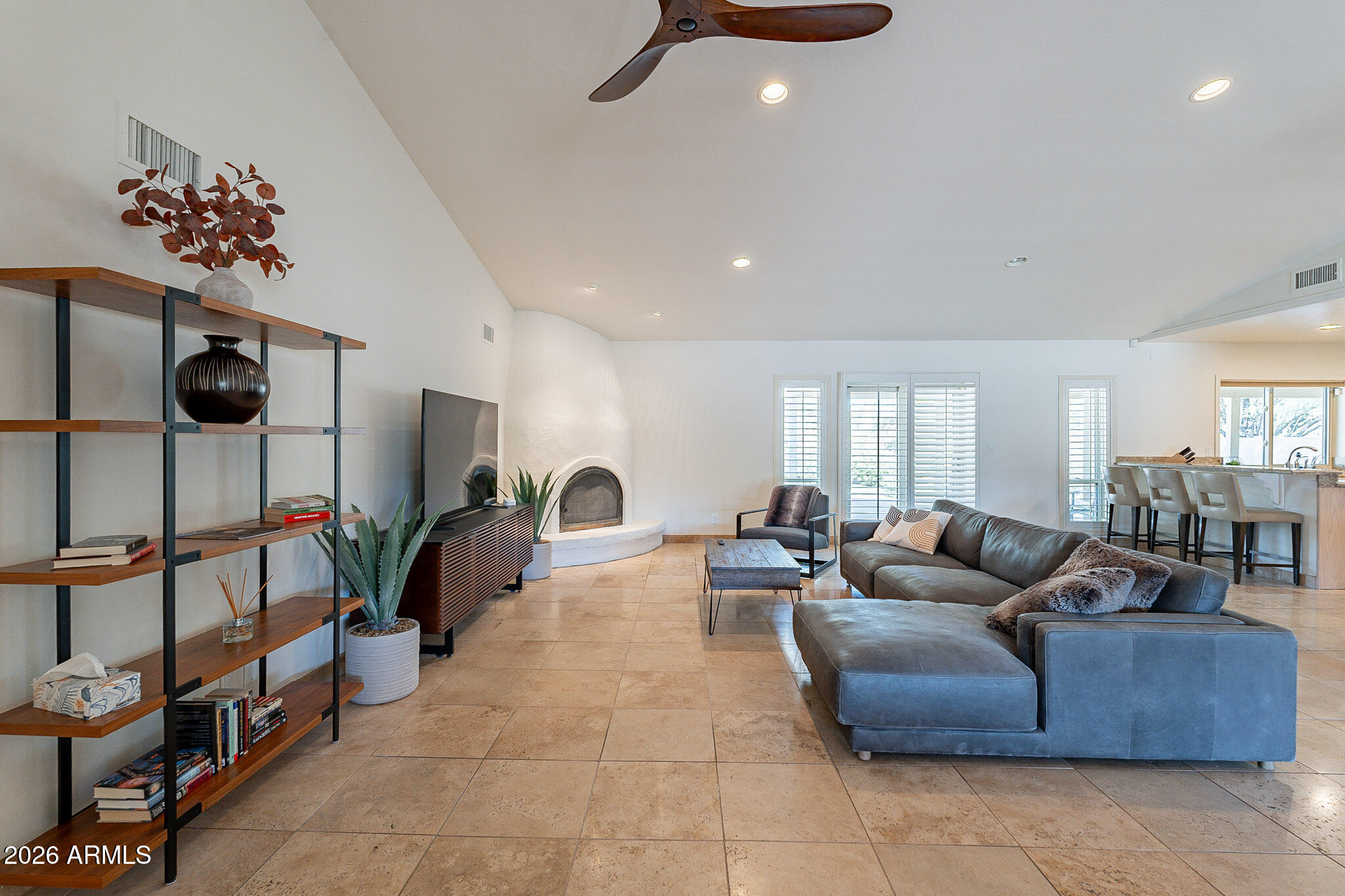 4226 East North Lane Phoenix, AZ 85028 - Photo 2 of 43 a living room with furniture and a flat screen tv