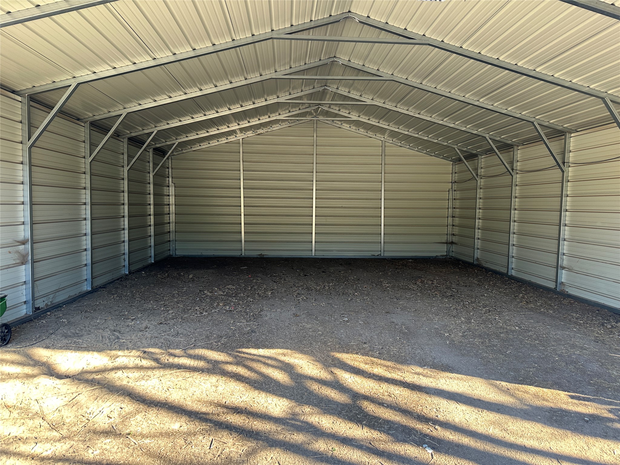 438 Mt Olive Road, Unit A Cedar Creek, TX 78612 - Photo 20 of 27 View of parking with a carport