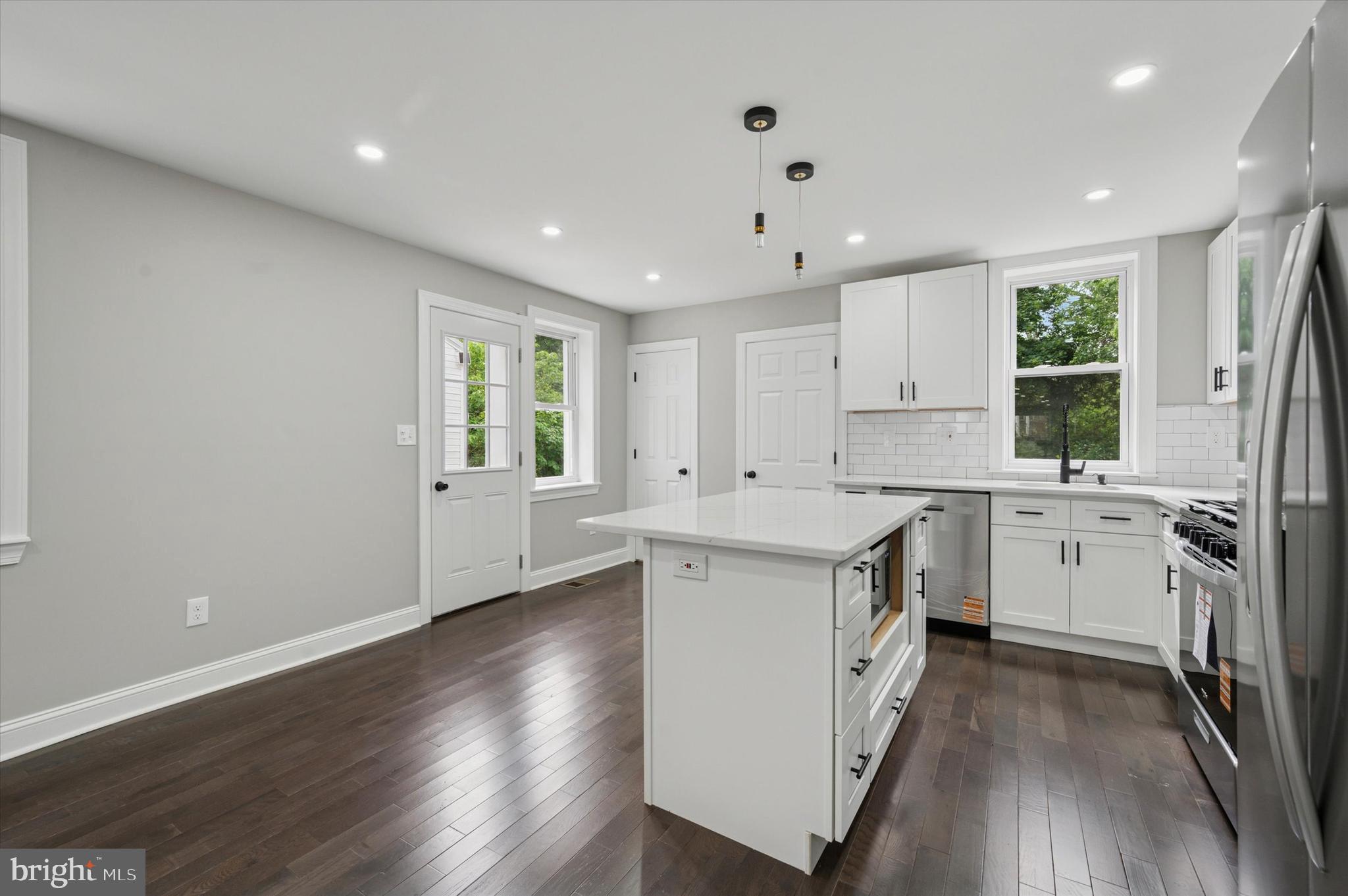 860 Rundale Avenue Lansdowne, PA 19050 - Photo 12 of 28 a kitchen with a sink wooden floor and stainless steel appliances
