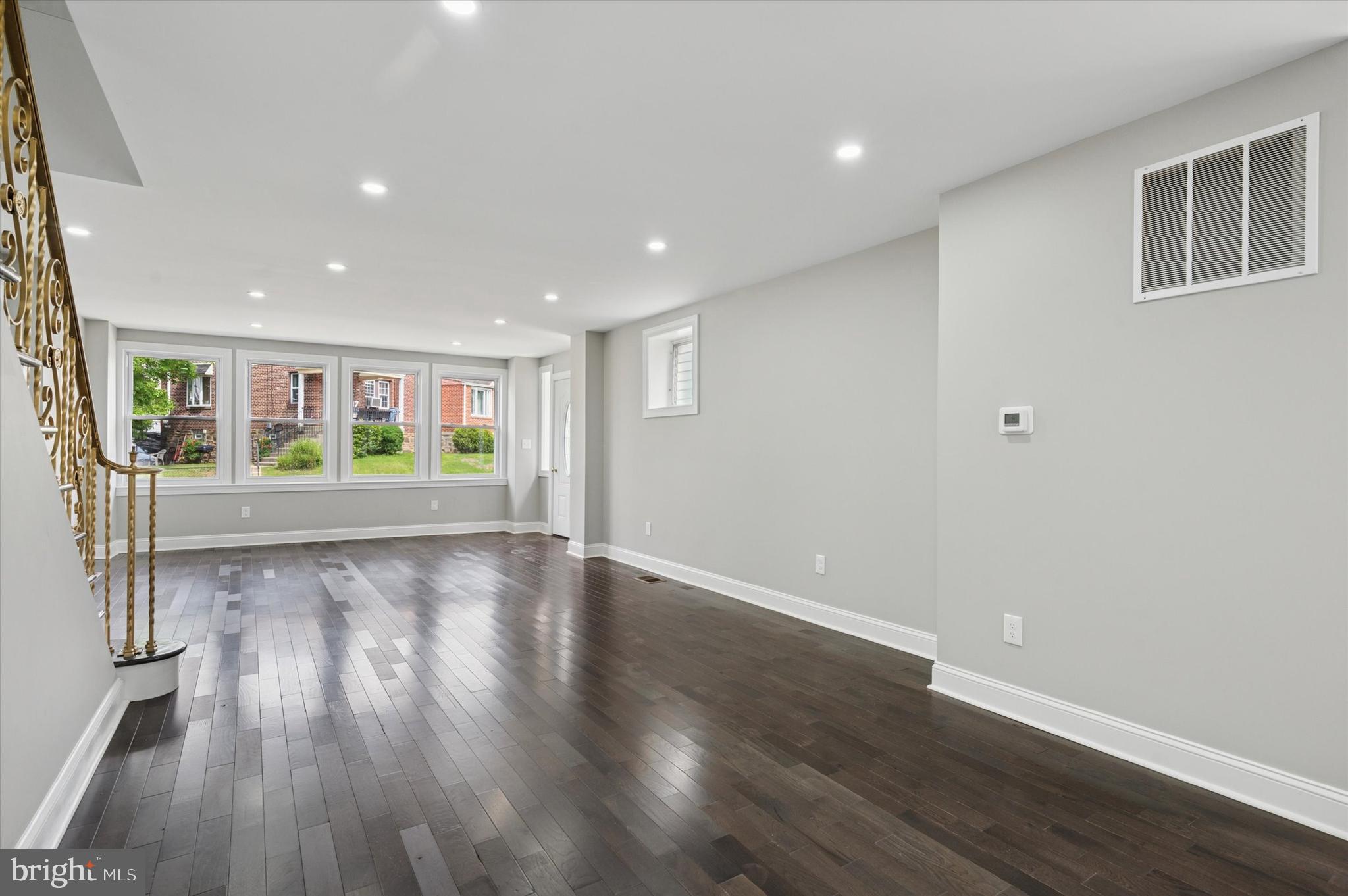 860 Rundale Avenue Lansdowne, PA 19050 - Photo 8 of 28 a view of an empty room with wooden floor and a window