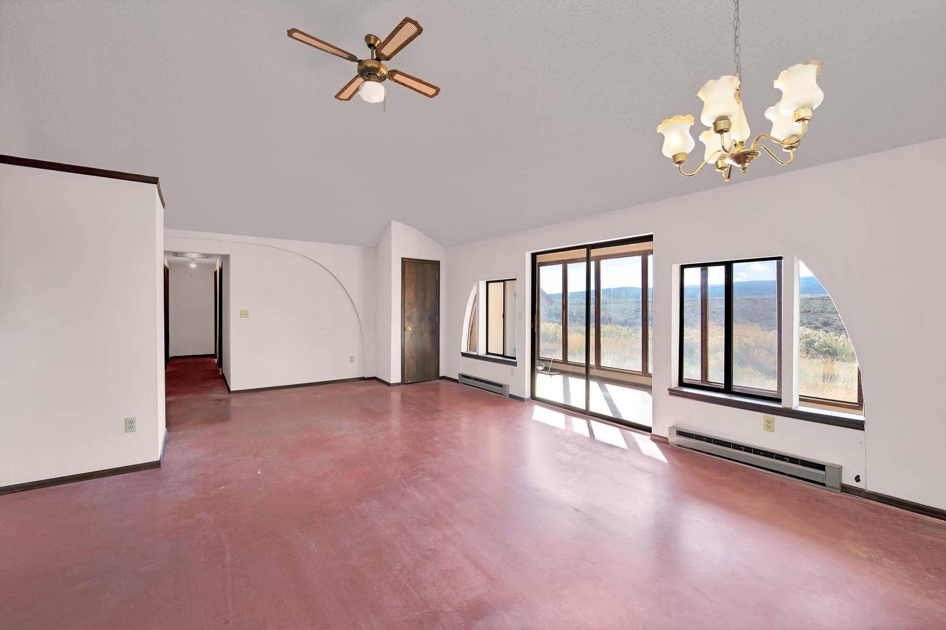 1041 South 16 1/2 Road Glade Park, CO 81523 - Photo 11 of 42 a view of an empty room with a window