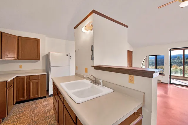 a view of cabinets with wooden floor