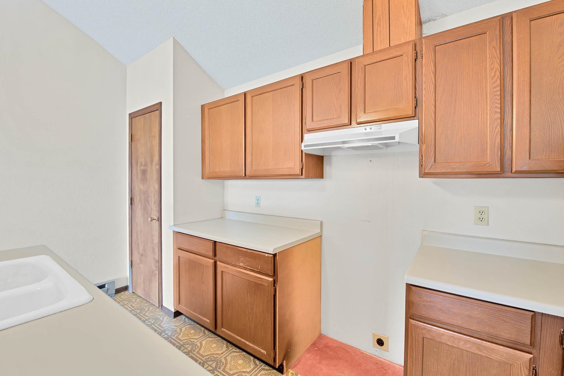1041 South 16 1/2 Road Glade Park, CO 81523 - Photo 15 of 42 a view of cabinets with wooden floor