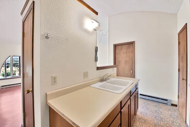 an empty room with windows