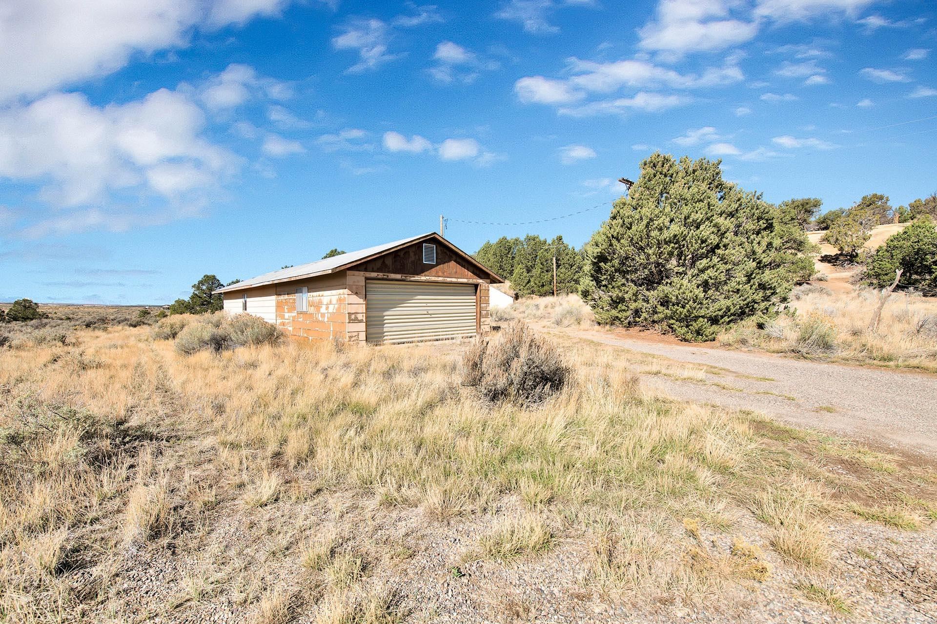 1041 South 16 1/2 Road Glade Park, CO 81523 - Photo 25 of 42 a view of a yard with wooden fence