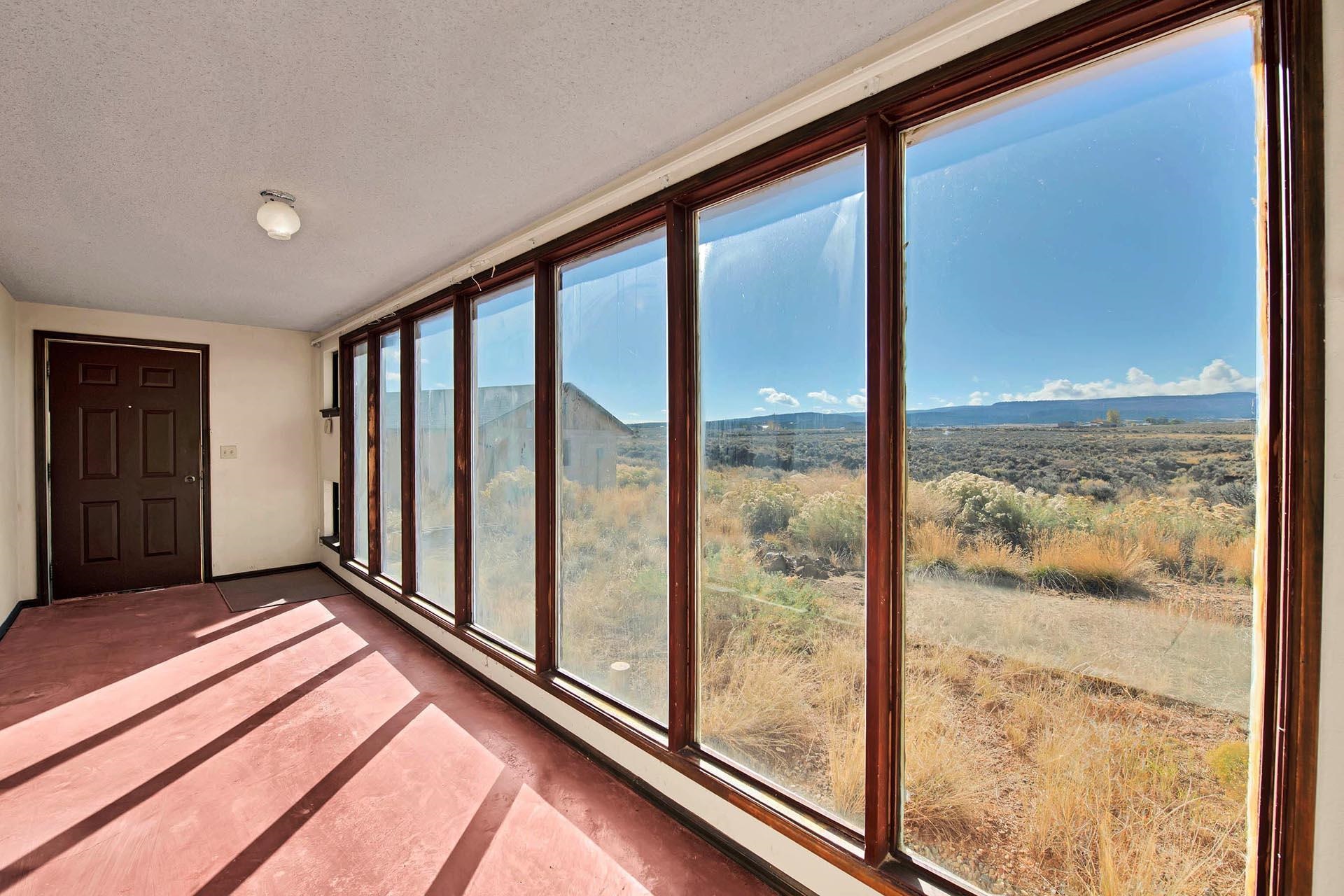 1041 South 16 1/2 Road Glade Park, CO 81523 - Photo 7 of 42 a view of an empty room and window