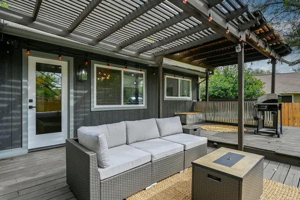 a outdoor living space with furniture and garden view