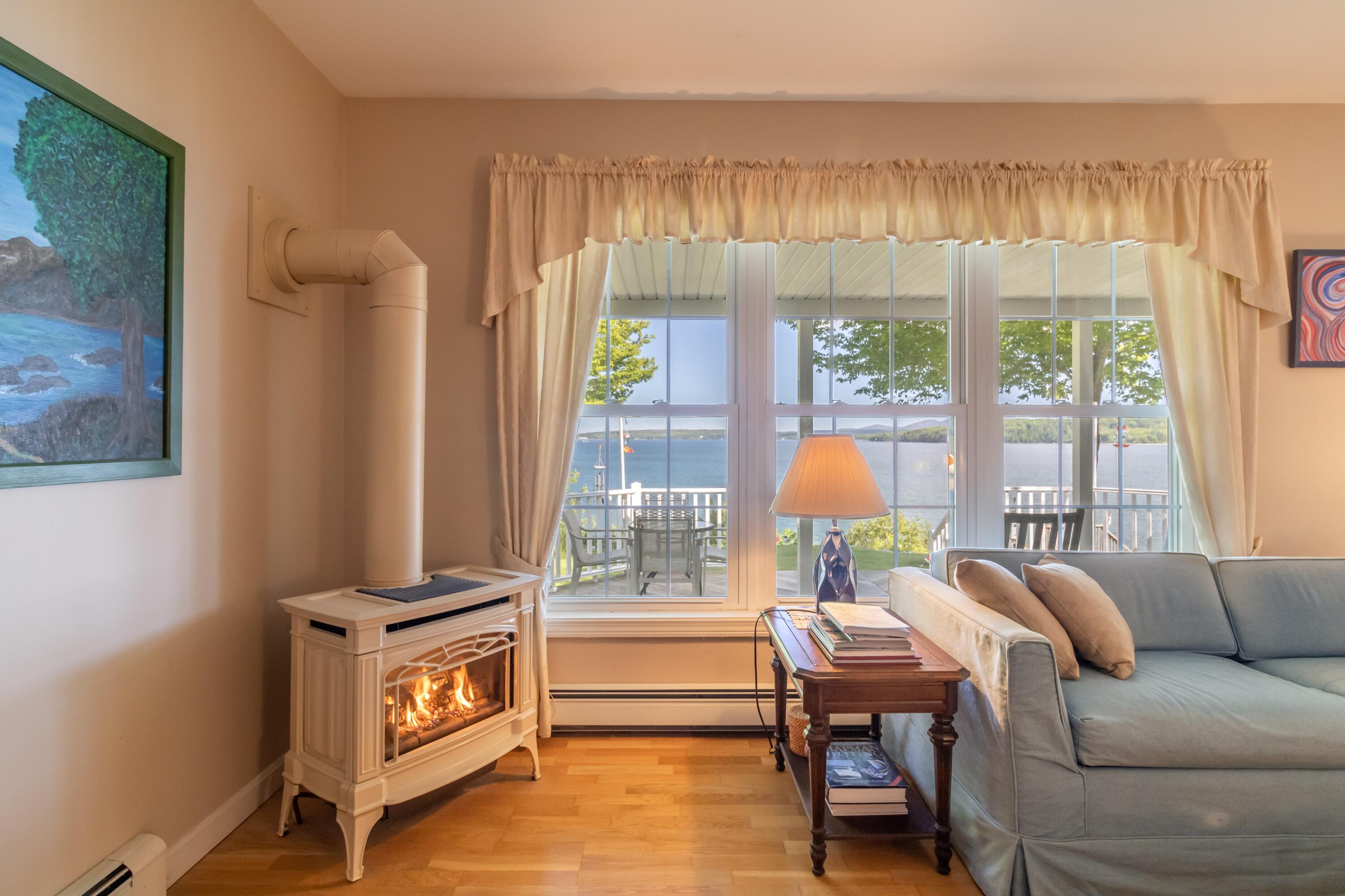 55 Fox Run Lamoine, ME 04605 - Photo 19 of 63 Propane fireplace/woodstove