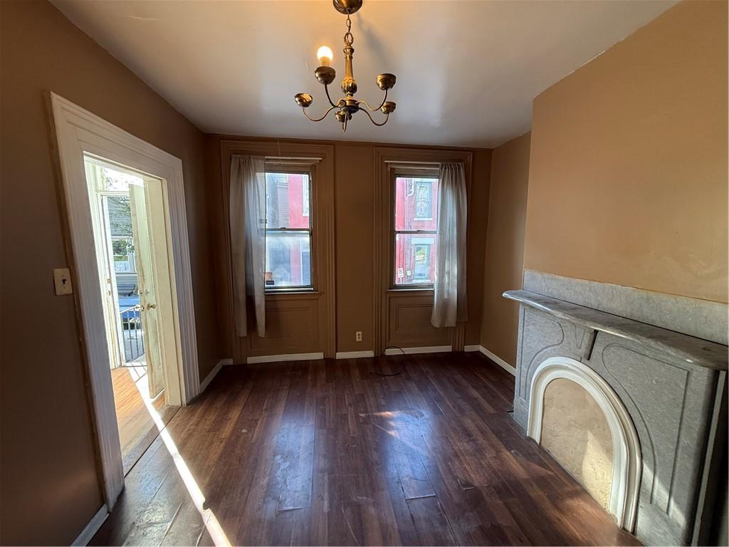 516 Armandale Street Pittsburgh, PA 15212 - Photo 3 of 17 a view of empty room with wooden floor and fan