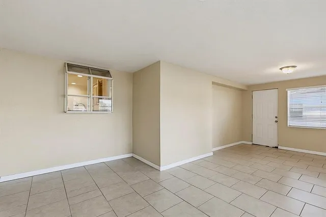 a view of an empty room with window