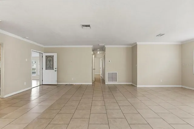 a view of an empty room with window