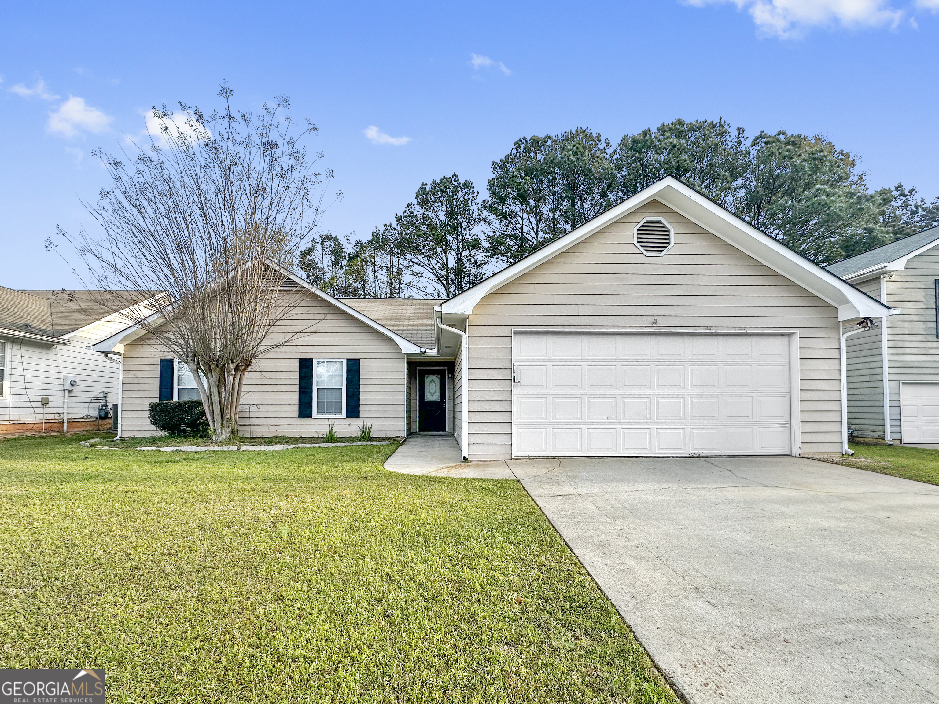 290 Cornwallis Way Fayetteville, GA 30214 - Photo 1 of 18 a view of a house with a yard