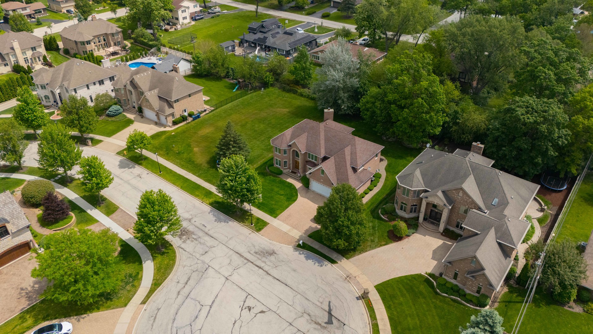 281 Forest Drive Addison, IL 60101 - Photo 11 of 14 an aerial view of a house with a garden and lots of trees