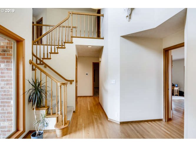 13848 Southwest Whitmore Road Hillsboro, OR 97123 - Photo 4 of 29 a view of entryway with wooden floor