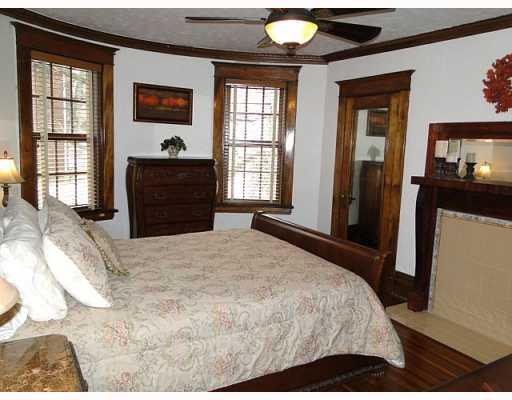43 Ralston Place Mt. Lebanon, PA 15216 - Photo 10 of 18 Master Bedroom. REFINISHED HARDWOOD FLOORS, FIREPLACE & TWO LARGE WINDOWS ADD CHARM TO THE ROOM