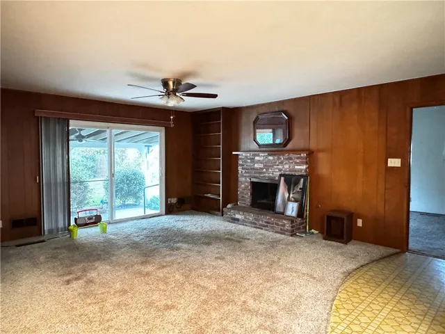a kitchen with sink refrigerator and microwave
