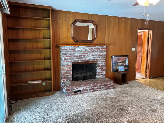 a view of livingroom with furniture and window