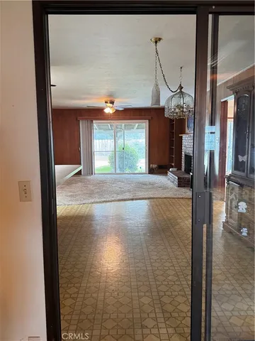 a view of an empty room and window