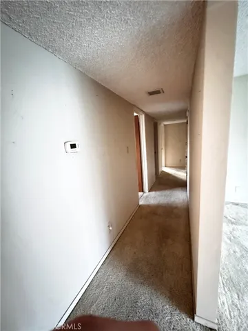 a bathroom with a shower and a sink