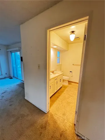 a bathroom with a sink and mirror
