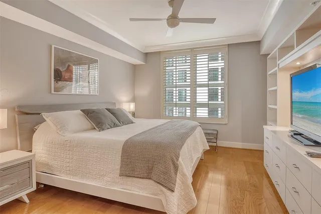 a bathroom with a granite countertop sink a mirror and a shower