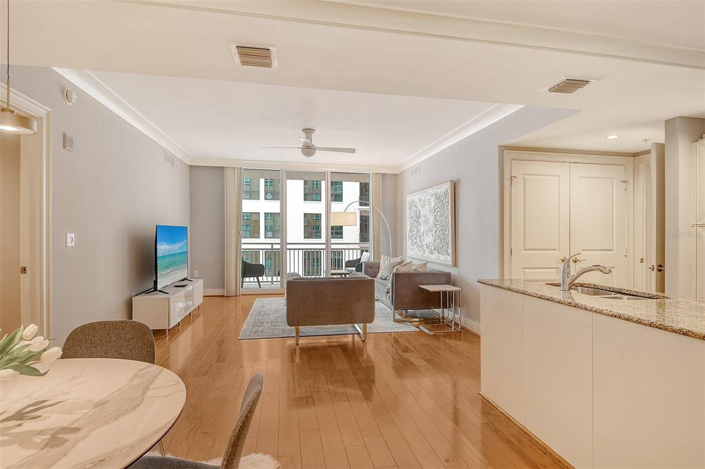 1350 Main Street, Unit 903 Sarasota, FL 34236 - Photo 5 of 71 a living room with furniture and a large window