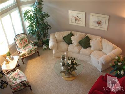 13755 Bear Valley Road Moorpark, CA 93021 - Photo 3 of 29 a living room with furniture and a potted plant