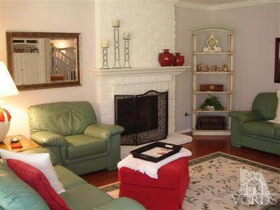 13755 Bear Valley Road Moorpark, CA 93021 - Photo 5 of 29 a living room with furniture and a fireplace