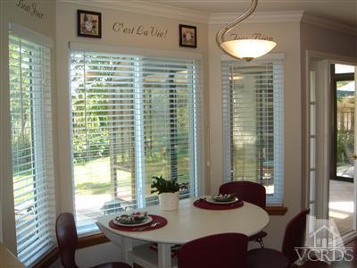 13755 Bear Valley Road Moorpark, CA 93021 - Photo 7 of 29 a view of a dining room with furniture and window