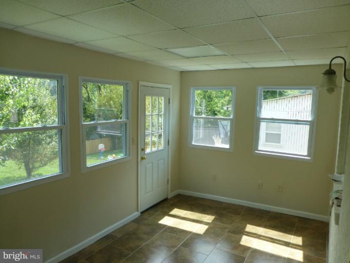 11925 Andrew Street Silver Spring, MD 20902 - Photo 18 of 23 a view of an empty room with window