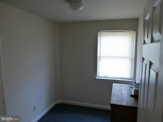 11925 Andrew Street Silver Spring, MD 20902 - Photo 19 of 23 an empty room with a window